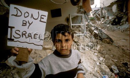 1102_boy_sign_palestine_israel_war_